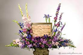 Memorial services and funerals can include elements of a traditional service, including music, flowers, prayers, readings, eulogies, and sermons. Cremation Urn Funeral Flowers Vickies Flowers Brighton Co Florist