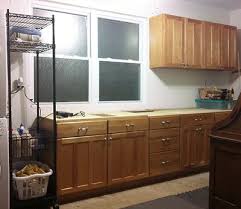 Reuse Old Kitchen Cabinets In Garage To Create A Workbench With Storage Kitchen Cabinets In Garage Old Kitchen Cabinets Workbench With Storage