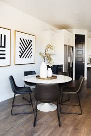 What Chairs To Pair With A Round Tulip Table The Tulip Table Is The Ultimate Modern Icon Its De Dining Room Small Round Dining Table Decor Dining Table Chairs