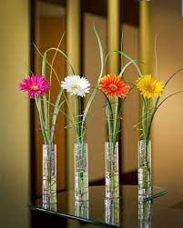 79 Insanely Stunning Wedding Centerpiece Ideas Pouted Com Daisy Centerpieces Flower Arrangements Flower Vases