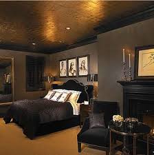 The blend of warmness of gold and cool shine of silver creates a transition between classical and fresh modern look in your bedroom. In Love With This As It Looks So Cozy And Warm Love The Brown Black Gold Color Palette Black Brown And Grey And Gold Bedroom Dark Bedroom Walls Gold Bedroom