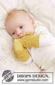 Strikkede Vanter Til Baby Med Falske Snoninger I Drops Baby Merino Storrelse 1 Mdr 4 Ar Tropfen Design Baby Faustlinge Freie Strickmuster