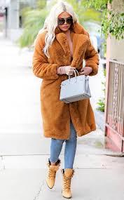Plastic surgery is the elephant in every room in every home inhabited by a kardashian. Khloe Kardashian From Celebs Best Street Style Street Style Khloe Kardashian Brown Coat