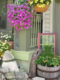 This vibrant white flower wreath is made from artificial magnolia that covers fully on the durable twigs vine base. 20 Ideas For Old Doors And Windows In The Garden Empress Of Dirt