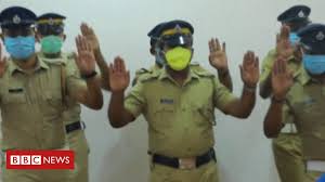 Indian policemen do coronavirus handwashing dance - BBC News