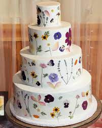 Using these edible flowers for cakes, you can make them look more beautiful while adding a dash taste to enhance the flavor! Buttercream Wedding Cake With Edible Wildflowers Cakedecorating