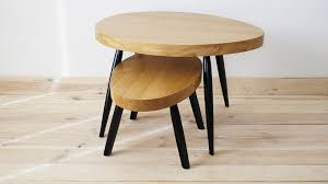 A pretty end table in a modern design and scandinavian style. Coffee Table Scandinavian Black Set By Projekt Drewno Archello