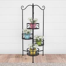 Foldable special decorative wooden plant stand for outdoor or greenhouse. Plant Stand 4 Tier Folding Wrought Iron Metal Home And Garden Display With Staggered Laser Cut Shelves By Pure Garden Black On Sale Overstock 27866269