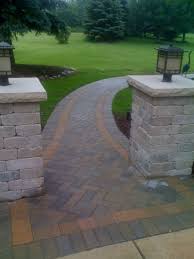 The last step in your curved paver walkway project is to clear off your patio, sweep in joint sand (or polymeric sand), and compact your stones. Walkway Design Gallery Paver Walkways Brick Natural Stone Walkways