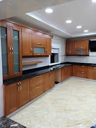 Cuisine moderne grise et bois, avec îlot central et façades sans poignées. Livraison Du Jour Cuisine En Bois Hetre Alliance Cuisine Facebook