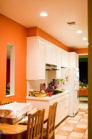 Orange kitchen walls with white cabinets. Orange Kitchen Kitchen Colors Orange Kitchen Walls Blue Kitchen Decor