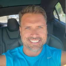 Does he look handsome in this photo?