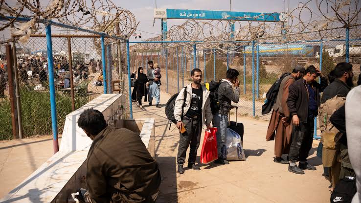 Caught Between Two Conflicts, Afghans Flee Iran - The New York Times