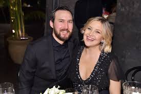 During an interview with aol, the mother of three talked about how she plans to raise her first daughter, rani rose, whom she welcomed in early october with partner danny fujikawa. Kate Hudson Shares Photos Of Baby Rani Rose With Son And Boyfriend
