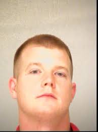 Bibb deputy arrested, accused of hitting handcuffed woman in face