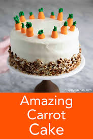 A Moist And Delicious Carrot Cake Topped Covered In Cream Cheese Frosting With Toasted Pecans And Topped Carrot And Walnut Cake Carrot Cake Recipe Carrot Cake