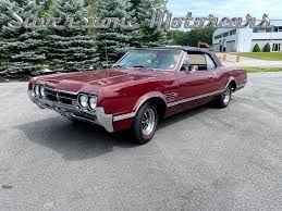 Image result for Claret Maroon 1966 GM