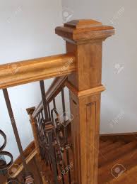 A newel post is the upright post that sits at the top and/or bottom of the balustrade to support a staircase banister and secure the balustrade. Hardwood Newel Post Staircase Classic Style Interior Steps Stairway Stock Photo Picture And Royalty Free Image Image 96994997