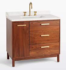 With a solid american walnut base and contemporary design, our exclusive warrenton single vanity will bring warmth and character to any bath. Warrenton Walnut Single Vanity Rejuvenation