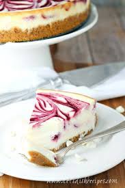 Pour the cheesecake mix evenly over the base. White Chocolate Raspberry Swirl Cheesecake Let S Dish Recipes