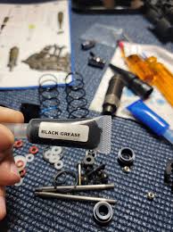 Is it ok to use the included black grease for the shock orings and shafts? 