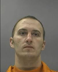 Former strip club manager indicted