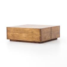 This coffee table with an ivory white bottom and a black circular top looks gorgeous. Duncan Storage Coffee Table Hidden Storage Drawers