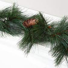 Set of 20 artificial pine needle picks for embellishing holiday florals, wreaths, and centerpieces. Artificial Wispy Pine Garland Christmas Garlands Christmas And Winter Holiday Crafts Factory Direct Craft