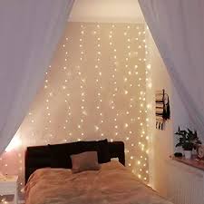 Make a starry backdrop for your bed, create a brilliant photo display or make a crafty bedside table lamp. Amazon Com Le Led Curtain Lights 9 8x9 8ft 306 Led 8 Modes Plug In Twinkle Lights Cool White Indoor Outdoor Decorative Wall Window String Lights For Bedroom Party Wedding Backdrop Patio Decor And More