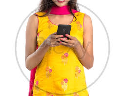 Image of Beautiful Indian Girl Looking at a Smart Phone With an Expression  on Face-LU592271-Picxy