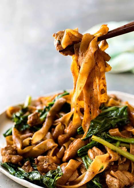 Pad See Ew: Wok-charred wide noodles that beat generic Pad Thai, AI generated
