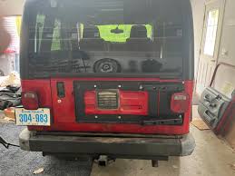 Image result for Flame Red 2005 Jeep