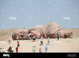 Jiuquan, China. 26th Aug, 2023. JIUQUAN, CHINA - AUGUST 13, 2023 - Aerial  photo of the sculpture Son of the Earth on the Gobi Beach in Guazhou,  Jiuquan, Gansu province, China, August