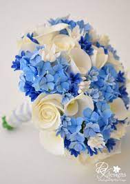 What are the best looking fake flowers? Love The Colors Looks Fake And Kinda Tacky Though Blue Wedding Bouquet Blue Wedding Centerpieces Hydrangea Centerpiece Wedding