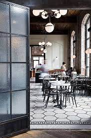 Industrial Inspired Restaurant Space With Exposed Brick Exposed Wooden Beams And Original Tiles Floors Restaurant Design Cafe Design Exposed Brick