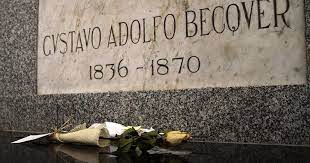 Los porqués de la Historia - Lápida de la tumba de Gustavo Adolfo Bécquer  en el Pabellón de Sevillanos Ilustres sito en la Iglesia de la Concepción  de la Anunciación de Sevilla.