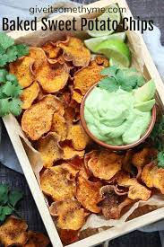 Baked Sweet Potato Chips Give It Some Thyme Baked Sweet Potato Chips Served With Avocado Lime Dip Is A H Sweet Potato Chips Sweet Potato Chips Baked Snacks