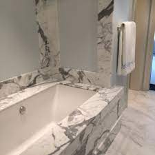 Surrounds can be constructed in many styles, ranging from a single row of ceramic tile that serves as a kind of backsplash around the tub, to fully covered walls that encase the three sides of a bathtub or shower alcove. Pin On Meyer Greeson Paullin Benson