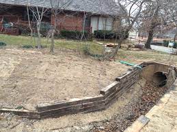 Railroad Tie Retaining Wall Installation In Tulsa Railroad Tie Retaining Walls Hardscaping Landscaping W Hardscape French Drains Railroad Tie Retaining Wall