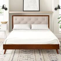The headboard has a slatted design that adds a touch of farmhouse style to this sleek frame. Modern King Platform Beds Allmodern