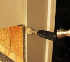 It can be screwed in or attached with adhesive. How To Remove A Kitchen Tile Backsplash Hometalk