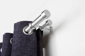 But how about a double rod (you can get these anywhere, even lowe's) with a shorter blackout curtain on. Cappa Double Curtain Rod Shop Adjustable Double Curtain Rods Umbra