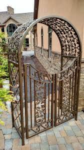 The arbor with gate adds a distinctive entry to any garden. Pin On Wrought Iron Metal We Made