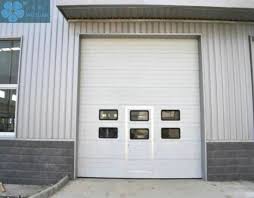 What are the shipping options for 36 x 84 commercial doors? China Color Steel Sandwich Panel With Pu Inside Sectional Overhead Sliding Industrial Doors With Pedestrian Gate China Sectional Door Overhead Door