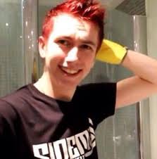 Simon with red/pink hair