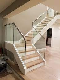 Slim Base Glass Railing Is An Innovative Way Of Attaching The Glass Panels To The Staircase The G Home Stairs Design Stair Railing Design Stairs Design Modern