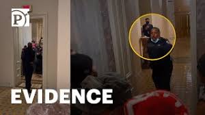 Viral capitol officer goodman escorts kamala harris to inauguration. New Parler Video Shows Tense Confrontation Between Rioters And Capitol Police Officer Eugene Goodman Youtube