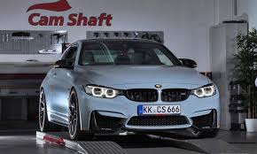 The bmw m4 coupé makes a completely different impression when hamann adds its aerodynamics kit: Bmw M4 By Cam Shaft De Goes Custom In Battleship Grey Orange Car Revs Daily Com