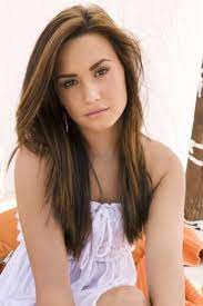 If she did, however, then the beauty enhancements were extremely refined and well done. Photo Shoot In A Natural Light Reflector Tent Demi Lovato Hair Long Hair Styles Beauty