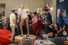 Female african american student with backpack holding coffee to go, isolated on white. The College Party Experience 2 Broke Girls Tv Fanatic